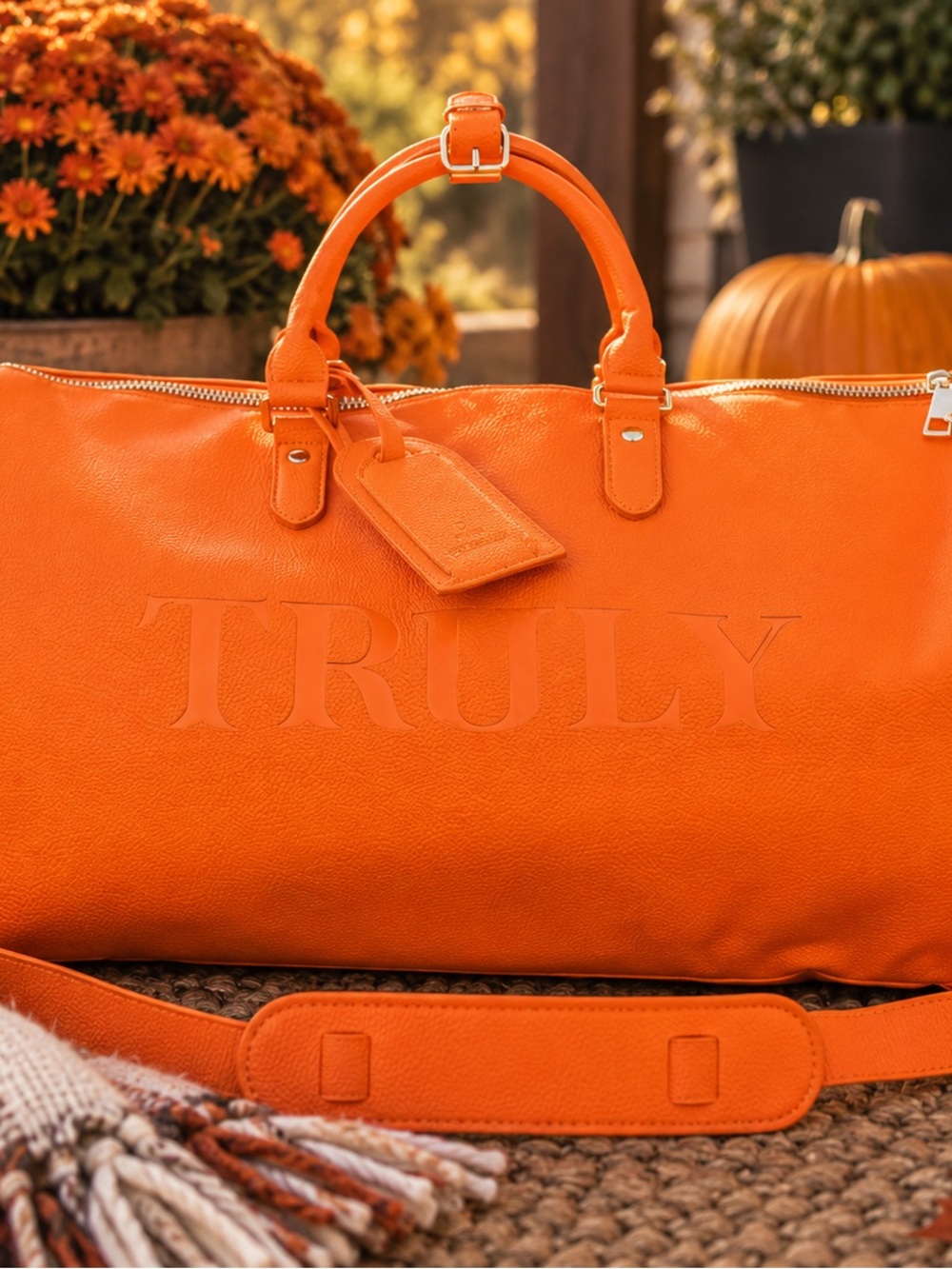 Truly Orange Leather Weekender Duffel Bag